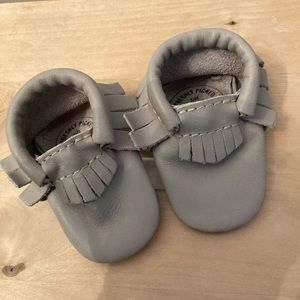 Freshly picked newborn soft crib moccs